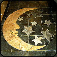 Stone mosaic moon and stars by Jim and Holly Cutting.